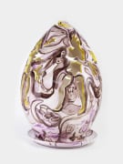 Lola Montes painted ceramic egg with angel-shaped cutouts