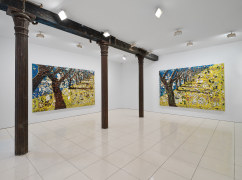 Installation view of Julian Schnabel plate paintings of trees