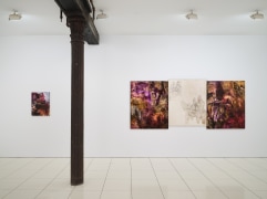 Installation view of Bill Jensen's Wandering Boundless and Free featuring colorful, abstract paintings