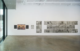 Installation image of drawings by Thomas Woodruff
