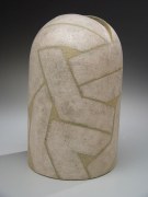 Rounded, leaning vase with linear patterning and metallic glaze, 1988