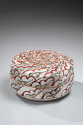 Ten-sided covered box with swirling abstracted patterning in red, yellow, and green, ca. 1990