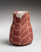 Red on creamy-white slip-glazed standing flower vessel with curvilinear designs, 1975
