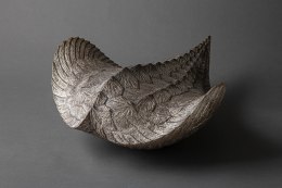 Tobu; Flying Ridged &#039;flying&#039; sculpture with linear incisions evoking scales and feathers&nbsp;