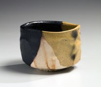 Kiseguro (Yellow and Black Seto) teabowl with hidasuki (straw burn marks), ca. 2010