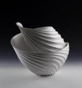 Standing ribbed, coiled leaf-shaped sculptural vessel with undulating open mouth and covered in creamy white matte glaze
