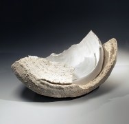 Roughly hewn vessel with two clay types and torn rims, 2011