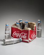 Box Coca Cola 22-4, Sculpture of a red cardboard Coca-Cola box containing six independent wrapped bottles of Coke