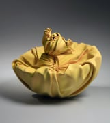 Large yellow sculpture in the shape of&nbsp;furoshiki&nbsp;(wrapping cloth), 2018