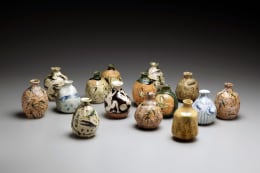 Set of 15 unique sake flasks, ca. 1995