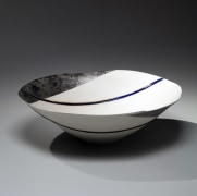 Large shallow largely unglazed bowl decorated with a linear pattern in platinum and blue glazes