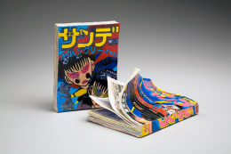 Pair of ceramic sculptures of Japanese comic books&nbsp;Sh&ucirc;kan Sh&ocirc;nen Jump and Sh&ucirc;kan Sh&ocirc;nen Sunday, ca. 1983