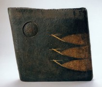 Large slab-built rectangular black-glazed vessel with landscape scene of recessed moon with birds in flight