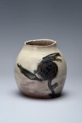White, leaning asymmetrical vessel with painted black floral design and scratched patterning, 1971