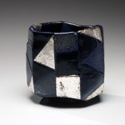 Large blue basara faceted teabowl with repeated triangle pattern in polychrome salt glazing with silver-leaf