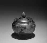 Round, smoke-infused lidded incense burner with incised lotus flower patterning, 2019