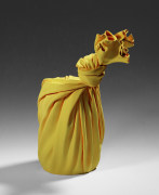 Yellow sculpture in the shape of a furoshiki (wrapping cloth)-wrapped square vessel&nbsp;, 2020
