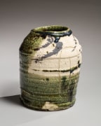 Green Oribe-glazed round tsubo (vessel) with iron-oxide splash patterning and incised decoration, 1990s