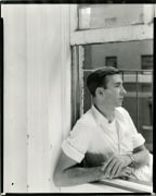 (Man sitting outside window, leaning in), n.d.