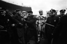 Cleveland Browns&#039; Jim Brown Walking Off Field Victorious, NFL Championship game vs Baltimore Colts, Municipal Stadium, Cleveland, OH, 1964, Silver Gelatin Photograph