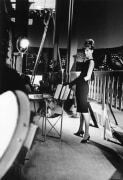 Audrey Hepburn on the set of Paris When it Sizzles with her dog &quot;Mr. Famous&quot; photographed for French Vogue, Paris, 1962
