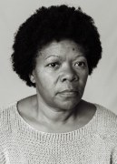 Portraits of Ana Maria Jeremias taken throughout the duration of this project-over four months - inspired by her portrait at age nine on the document from her arrival in Portugal. Lisbon, Portugal, 2024