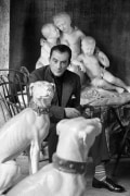 Luchino Visconti with Dog Sculpture in his house in Roma, Italy, 1963
