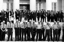 State troopers arrayed on steps of Montgomery, Alabama State House. Officials on top steps, Selma to Montgomery, Alabama Civil Rights March, March 25, 1965