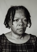 Portraits of Ana Maria Jeremias taken throughout the duration of this project-over four months - inspired by her portrait at age nine on the document from her arrival in Portugal. Lisbon, Portugal, 2024