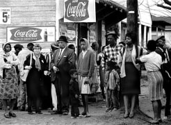 People on street corner watching marchers, Selma to Montgomery, Alabama Civil Rights March; March 23-25, 1965