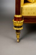 Box Sofa, about 1820. Attributed to Duncan Phyfe (1770&ndash;1854), New York. Rosewood and mahogany, partially paint-grained rosewood and gilded, brass line inlay, gilt-brass sabots and castors, and upholstery, 33 3/4 in. high, 82 in. long, 27 1/4 in. deep (detail).