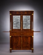 Cabinet with Mirrored Doors, about 1820. Attributed to Duncan Phyfe (1770&ndash;1854), New York. Mahogany, with ormolu capitals and bases, gilt-brass door moldings, keyhole liners, and knobs, marble, and mirror plate 78 5/8 in. high, 35 in. wide, 22 in. deep (overall). Frontal view, with slides extended.