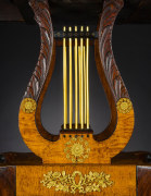 Card Table with Lyre Base, about 1815. Philadelphia. Mahogany, with gilt-brass paw toe caps and castors, strings for the lyres, and gilt-brass and ormolu mounts 28 1/2 in. high, 35 in. wide, 17 1/2 in. deep (at the top), 18 in. deep (at the castors). Detail of open lyre pedestal.