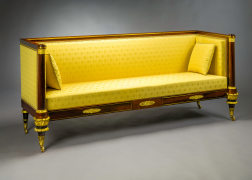 Box Sofa, about 1820. Attributed to Duncan Phyfe (1770&ndash;1854), New York. Rosewood and mahogany, partially paint-grained rosewood and gilded, brass line inlay, gilt-brass sabots and castors, and upholstery, 33 3/4 in. high, 82 in. long, 27 1/4 in. deep.