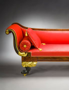 R&eacute;camier in the Neo-Classical Taste, about 1820. Attributed to Duncan Phyfe, New York. Mahogany, partially gilded and painted verde antique, with die-stamped gilt-brass mounts, &shy;bolster buttons, and castors, and die-stamped brass inlaid with ebony. 32 in. high, 82 3/4 in. long, 24 1/2 in. deep