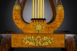 Card Table with Lyre Base, about 1815. Philadelphia. Mahogany, with gilt-brass paw toe caps and castors, strings for the lyres, and gilt-brass and ormolu mounts 28 1/2 in. high, 35 in. wide, 17 1/2 in. deep (at the top), 18 in. deep (at the castors). Closeup detail of ormolu mounts on open lyre pedestal and platform.