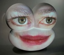 Big Eyes, 2003. Fiberglass Sculpture and DVD Projection, 24 x 24 x 12 inches. MP 362