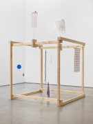 Untitled, 2018. Wood, plastic bag, metal stands, wooden spoon, string, shoelaces, screws, towel, sock, plastic lids, mesh,