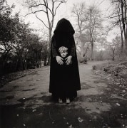 Young Boy and Hooded Figure, NY, 1971