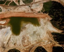 Excavation, deforestation, and waste pond, June 20, 1984