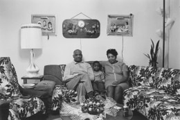 Husband and wife at home with their youngest child, Detroit, 1968