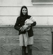 Woman Holding baby in Snow Suit, Cole Street, Haight Ashbury, 1968