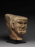 Artist Unknown, A grimacing stone head, England, 14th century