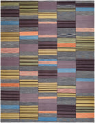 kia sar flatweave kilim with five panels. its stripes are dark-toned interspersed with bright oranges, blue, and yellow