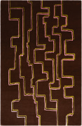 via in the retro colorway. this rug is brown with pink and green zipper-like lines going vertically across the rug