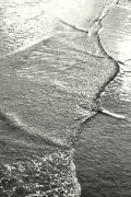tania johnson's shore rug appearing exactly as its namesake of ocean waves meeting the sand
