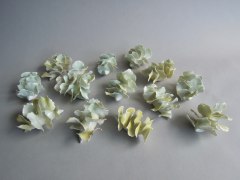 Chris Garofalo.&nbsp;yoovzoo (betterflies),&nbsp;2020. Glazed porcelain, 4 x 3 x 2.5 inches, each.