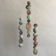 Chris Garofalo.&nbsp;t&uuml;hi kest, 2020. Glazed porcelain, indian agate and glass beads, 15-13 x 3 x 3 inches, each.&nbsp;