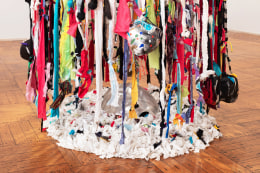 This is an image of a mixed media installation artwork made by John Outterbridge in 2012 titled: Rag Factory III.