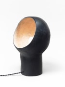 Andr&eacute; Borderie ceramic table lamp side view with light on